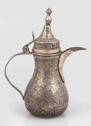 A Persian 925 silver coffee pot with engraved decoration, 20th century, 18.5cm high, 254 grams.