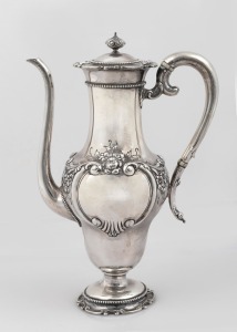 An antique American silver coffee pot by E. Caldwell & Co. of Philadelphia, 19th century, 26cm high, 550 grams.