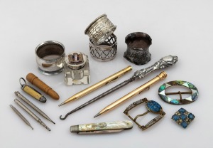 Silver plated napkin rings, sterling silver and enamel topped inkwell, button hook, pen knives, costume brooch and belt buckles, vintage retractable pencils etc, 19th/20th century, (qty)