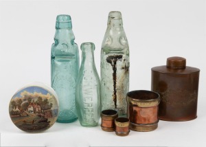 Antique bottles, antique copper and brass measures, copper tea cannister and Pratt ware pot with lid, 19th/20th century, (8 items), the largest 25cm high.
