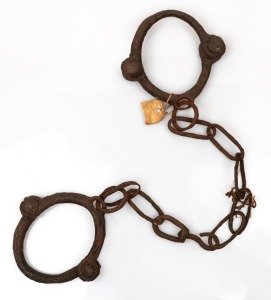 Antique blacksmith made horse hobbles in relic condition, 19th century, 90cm long overall.