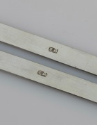 TUCK CHANG antique Chinese export silver with dragon decoration, together with a pair of Chinese silver scroll weights, 19th/20th century, (3 items), the server 25cm long, 183 grams total. - 3