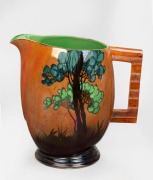 CARLTON WARE "Rabbits at Dusk" orange lustre glazed porcelain jug, black factory mark to base, ​​​​​​​17cm high.