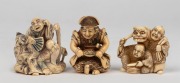Three Japanese carved ivory netsuke figural groups, including two examples with hand-coloured finish, 20th century, the largest 4.5cm high.