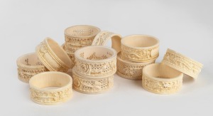 230 · Two sets of six Chinese carved ivory napkin rings, one example with dragon decoration and the other with pierced floral decoration, 20th century, (12 items).