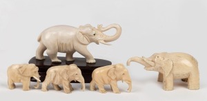 Five assorted carved ivory and bone elephant ornaments, including one on timber stand, mixed origins and vintages, the largest 7cm high, 11cm long overall.