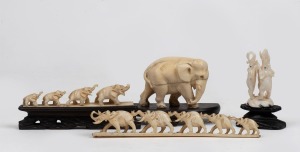 Two carved ivory elephant bridges, carved ivory elephant statue and a carved ivory elephant stand, 19th/20th century, (4 items), the largest 15cm long overall.