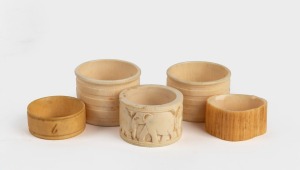 Five assorted turned and carved ivory napkin rings, 19th/20th century.