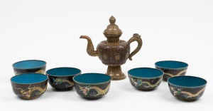A Tibetan copper and brass teapot; together with seven assorted Chinese cloisonne bowls with dragon decoration, 20th century, (8 items), the teapot 21cm high.