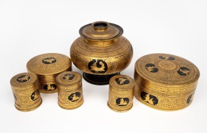 167 · Six assorted vintage Burmese circular boxes with hand-painted gilt decoration, mid 20th century, the largest 20cm high, 22cm diameter.