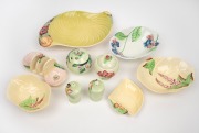 CARLTON WARE English floral porcelain table ware, including toast rack, condiments, sugar pots, bowls etc.; together with a SHORTER & SONS porcelain fruit bowl, 20th century, (10 items), the largest 30cm wide.