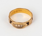 An antique English 15ct gold mourning ring with woven hair and seed pearls, circa 1840, ​​​​​​​3 grams.