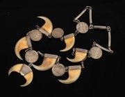 An antique Indian silver necklace, set with claws and silver coins, 19th/20th century, ​​​​​​​47cm long. - 2