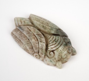 An antique Chinese carved jade cicada, Qing Dynasty, 18th/19th century, 8cm long.