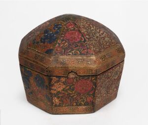 297 · An antique Kashmiri lacquered box, beautifully decorated with hand-painted floral finish, 19th/20th century, 15cm high, 17cm wide.