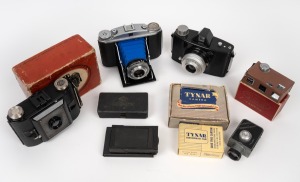 VARIOUS MANUFACTURERS: Group of five cameras comprising 1936 Agfa Ansco "Clipper PD-16" (in box), 1948 Top Camera Works "Top", 1950 Tynar "Tynar", 1950 Agfa "Isolette II", and 1958 Agfa "Click-I" (in box), plus three accessories. (8 items)
