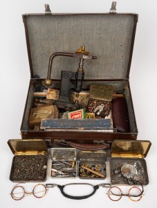 An antique French watchmaker's bushing press; together with assorted vintage spectacles and sundry items, contained within a vintage brown leather case, 19th/20th century, the press 20cm high.