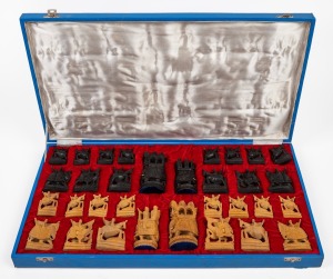 An Indian carved sandalwood and bone chess set in original blue fitted case, mid 20th century.