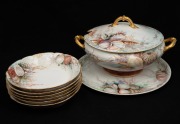 A porcelain soup service comprising of a tureen, platter and six bowls, attractively decorated with post factory hand-painted marine finish on Haviland vintage French porcelain, 20th century, (8 items), ​​​​​​​the tureen 29cm across the handles.