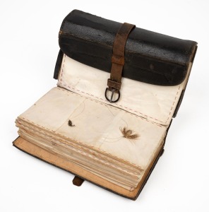 FLY FISHING INTEREST. A handsome selection of antique fishing flies housed in original leather wallet retailed by the ARMY & NAVY CO. OP. SOCIETY STORE, 19th century, 15cm wide.