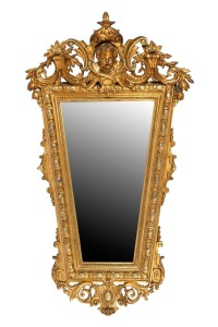 An antique English gilt framed mirror of unusual tapered form with putti crest, 19th century, ​​​​​​​100 x 57cm.
