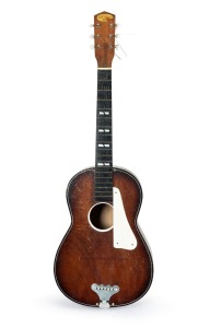 "COL JOYE" vintage guitar in original faux crocodile skin case, made in Melbourne, mid 20th century.