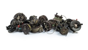 Assorted vintage fishing reels, including bakelite and timber examples, 20th century.