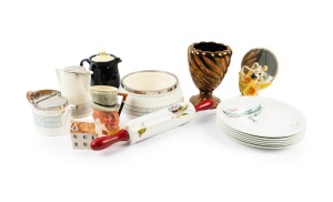 Continental porcelain salad bowl, jug and hot water pot; together with a porcelain rolling pin, vase, character jug, money box, figural mirror and plates, 20th century, (15 items).