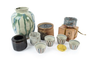 Assorted Japanese pottery and ceramic bowls, vessels and lidded box, mixed vintages, (11 items), the largest 27cm high.