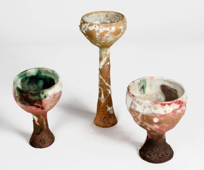 JOHN PERCIVAL: Three pottery goblets each with incised signature on the stems. 12.5cm to 21.5cm