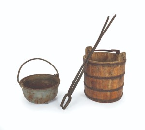 Foundry cast iron pot and tongs; together with a vintage wooden bucket of coopered construction, (3 items), the tongs 72cm long.