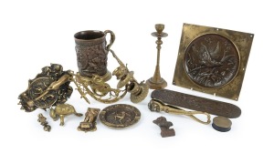 Assorted copper and brass ware including piano sconces with griffin mounts, door knockers, plaques, ornaments etc., 19th and 20th century, (qty).