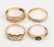 Four assorted 9ct gold rings with stones, 20th century, ​​​​​​​8.3 grams total.