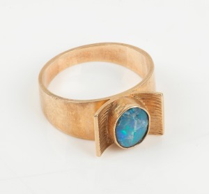 A vintage 9ct gold and opal designer ring, circa 1970s, 4.8 grams.