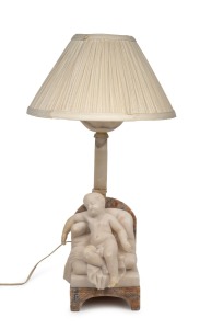 An antique carved marble and alabaster table lamp with putti figure, 19th/20th century, A/F, 55cm high overall.
