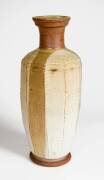 HAROLD HUGHAN: Art pottery vase c1970 with cut sided, feldspa & iron glaze in browns & cream. Full hand written signature to base & incised monogram to the side. Vases if this size seldom seen. Height 51cm&nbsp;