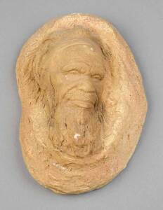 WILLIAM RICKETTS: Pottery face plaque of an aboriginal elder, incised signature. 20 x 14cm