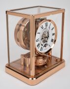 JAEGER LECOULTRE "Classique Phases De Lune" Atmos clock in rose gold plated case, with month and phases of the moon, circa early 2000s, 23cm high. - 3