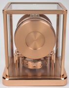 JAEGER LECOULTRE "Classique Phases De Lune" Atmos clock in rose gold plated case, with month and phases of the moon, circa early 2000s, 23cm high. - 5