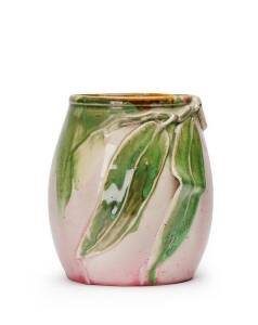 REMUED: Barrel shaped pottery vase with gum leaves. Early & desirable colourway in pink & green glaze. 15.5cm