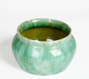 JOHN CAMPBELL: Tasmanian green glazed pottery vase. Height 13cm, width 22cm&nbsp;