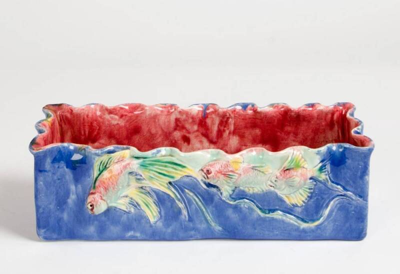 CASTLE HARRIS: Pottery flower trough with three applied goldfish, glazed in blue, pink, green & yellow. Incised signature. Height 9.5cm, width 31cm, depth 11cm