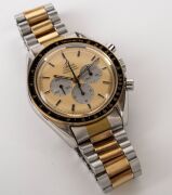 OMEGA "SPEEDMASTER PROFESSIONAL MOON WATCH" in two-tone stainless steel and gold finished case and original bracelet, circa 1984. - 4