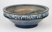 MOORCROFT "Fish" pattern English pottery bowl with inscription "GOD HAS GIVEN US MEMORY THAT WE MAY HAVE ROSES IN DECEMBER", impressed "Moorcroft, Made In England', 7cm high, 20.5cm diameter. - 8