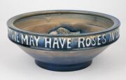MOORCROFT "Fish" pattern English pottery bowl with inscription "GOD HAS GIVEN US MEMORY THAT WE MAY HAVE ROSES IN DECEMBER", impressed "Moorcroft, Made In England', 7cm high, 20.5cm diameter. - 9