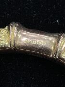 An antique gold plated silver bangle, a sterling silver bangle with leaf decoration, two pairs of antique sterling silver cufflinks, and two watch chains, 19th/20th century, (6 items). - 2