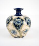 MOORCROFT "Florian Ware" pattern pottery on cream ground, stamped "Florian Ware, J.S. MacIntyre & Co. Ld., Burslem, England" plus green "Moorcroft" signature mark, 14cm high. - 8