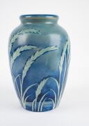 MOORCROFT "Wind Swept" salt glazed pottery vase on blue ground, impressed signature mark to base "Moorcroft, Potter To H.M. The Queen, Made In England", 24.5cm high. - 5