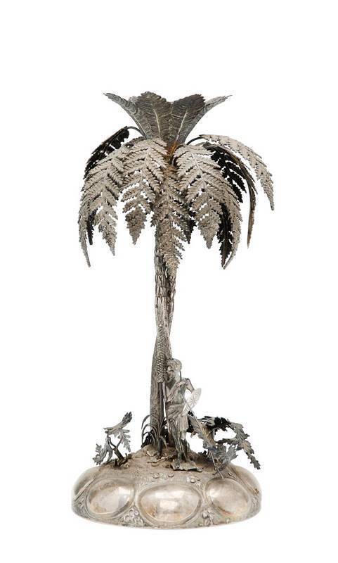 Australian silver emu egg stand with aboriginal figure amongst ferns & grass tree. Mid to late 19th century. 27cm