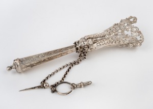 An antique silver posy holder with pierced floral decoration, 19th century, 14.5cm high